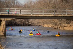 Kayakers floating down the Baraboo River